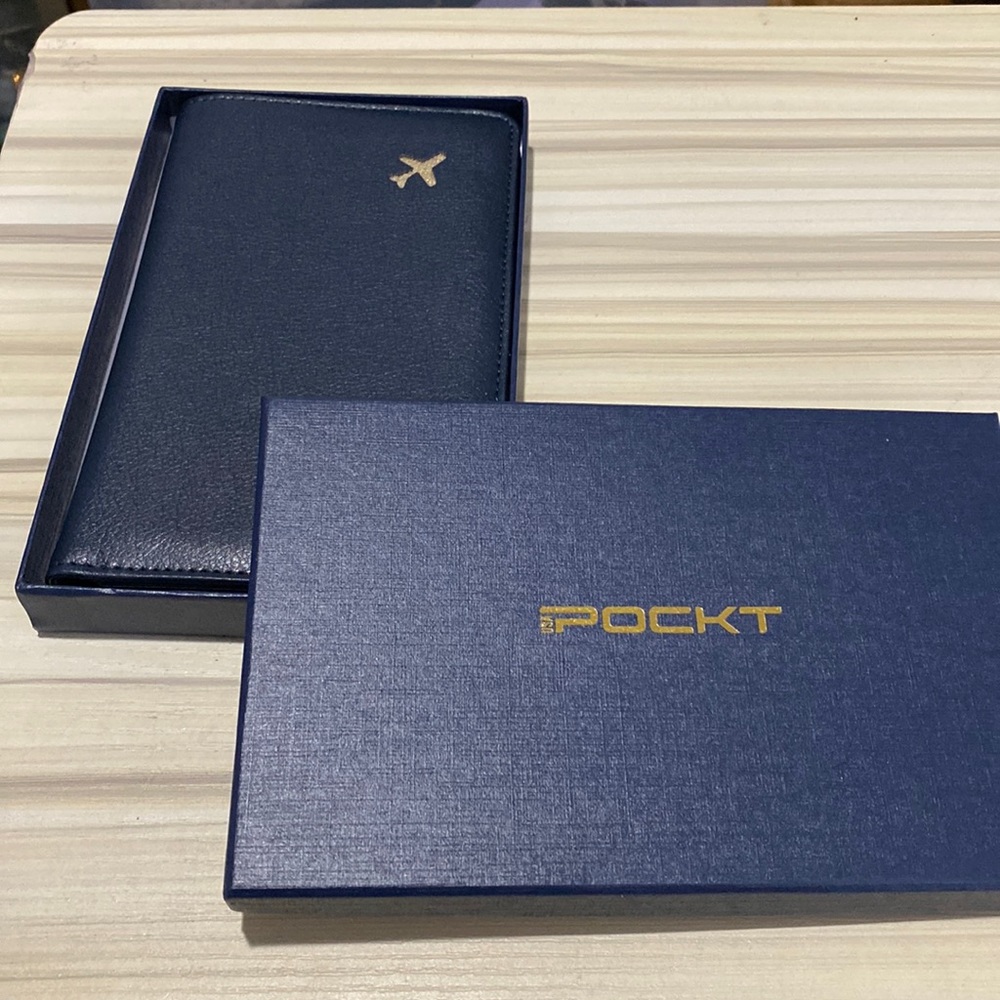 Brand New. Pockt Navy Blue Passport Holder.